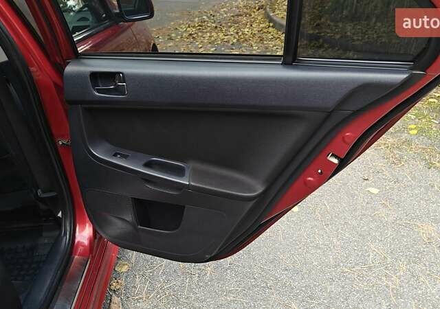 Міцубісі Lancer 2007 у Києві на Automoto.ua Червоний Міцубісі Lancer, об'ємом двигуна 2 л та пробігом 186 тис. км за 5600 $, фото 29 на Automoto.ua