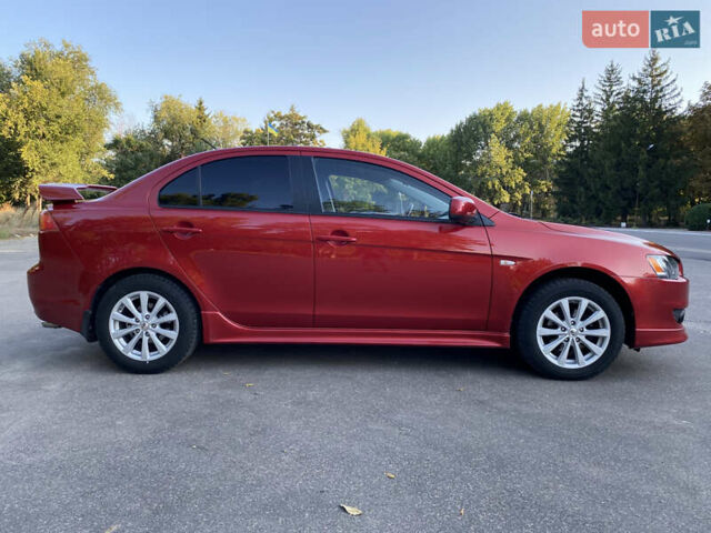 Червоний Міцубісі Lancer, об'ємом двигуна 2 л та пробігом 153 тис. км за 6700 $, фото 7 на Automoto.ua