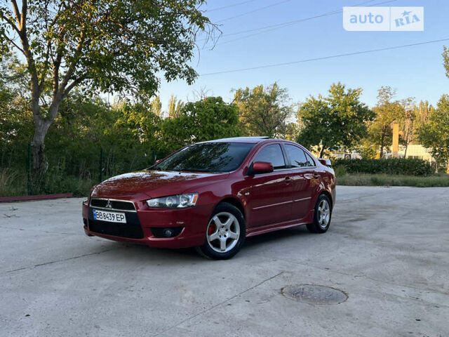 Червоний Міцубісі Lancer, об'ємом двигуна 2 л та пробігом 250 тис. км за 6500 $, фото 1 на Automoto.ua