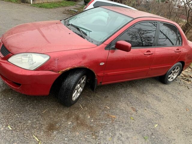 Червоний Міцубісі Lancer, об'ємом двигуна 1.6 л та пробігом 300 тис. км за 2799 $, фото 2 на Automoto.ua