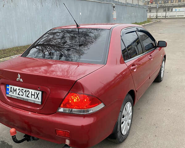 Червоний Міцубісі Lancer, об'ємом двигуна 1.58 л та пробігом 151 тис. км за 5600 $, фото 7 на Automoto.ua