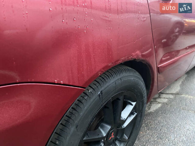 Красный Мицубиси Лансер, объемом двигателя 1.58 л и пробегом 269 тыс. км за 3899 $, фото 8 на Automoto.ua