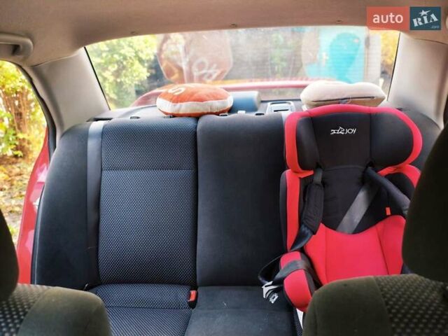 Красный Мицубиси Лансер, объемом двигателя 1.6 л и пробегом 214 тыс. км за 5000 $, фото 8 на Automoto.ua