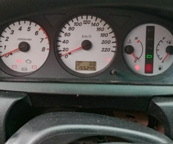 Красный Мицубиси Лансер, объемом двигателя 1.6 л и пробегом 155 тыс. км за 2000 $, фото 1 на Automoto.ua