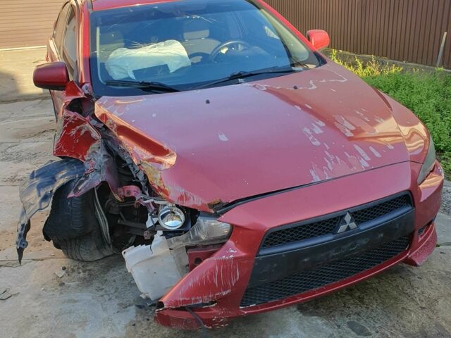 Красный Мицубиси Лансер, объемом двигателя 2 л и пробегом 406 тыс. км за 2750 $, фото 2 на Automoto.ua