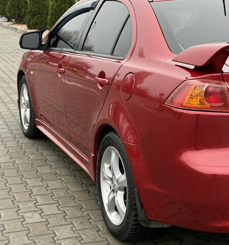 Красный Мицубиси Лансер, объемом двигателя 2 л и пробегом 261 тыс. км за 7200 $, фото 5 на Automoto.ua