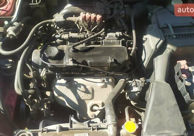 Червоний Міцубісі Lancer, об'ємом двигуна 1.58 л та пробігом 280 тис. км за 4300 $, фото 2 на Automoto.ua