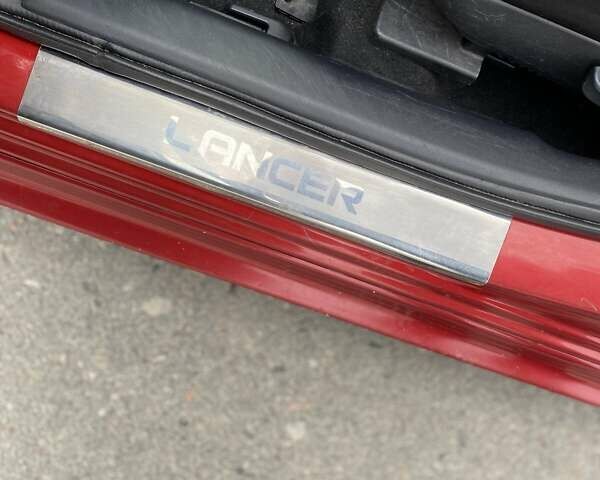 Червоний Міцубісі Lancer, об'ємом двигуна 1.5 л та пробігом 143 тис. км за 6800 $, фото 7 на Automoto.ua