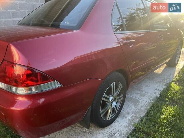 Красный Мицубиси Лансер, объемом двигателя 0 л и пробегом 282 тыс. км за 5200 $, фото 8 на Automoto.ua