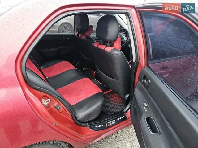 Червоний Міцубісі Lancer, об'ємом двигуна 1.6 л та пробігом 267 тис. км за 2999 $, фото 8 на Automoto.ua