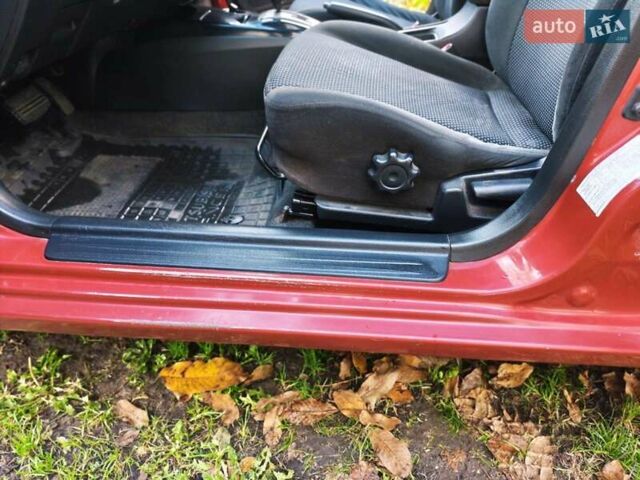 Красный Мицубиси Лансер, объемом двигателя 1.6 л и пробегом 214 тыс. км за 5000 $, фото 11 на Automoto.ua