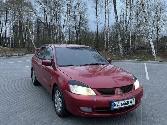 Червоний Міцубісі Lancer, об'ємом двигуна 1.6 л та пробігом 268 тис. км за 4800 $, фото 6 на Automoto.ua