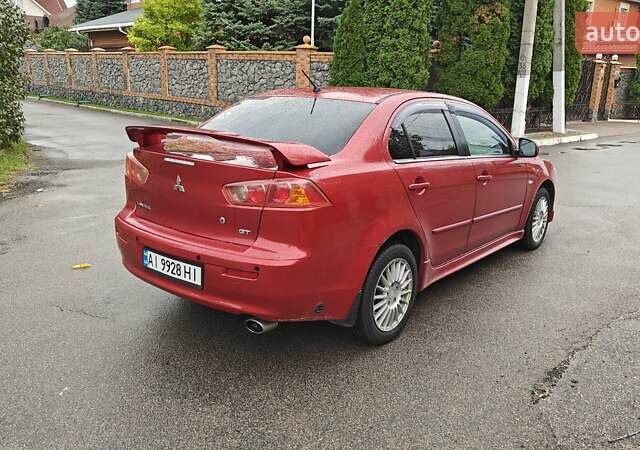 Червоний Міцубісі Lancer, об'ємом двигуна 2 л та пробігом 186 тис. км за 5600 $, фото 8 на Automoto.ua