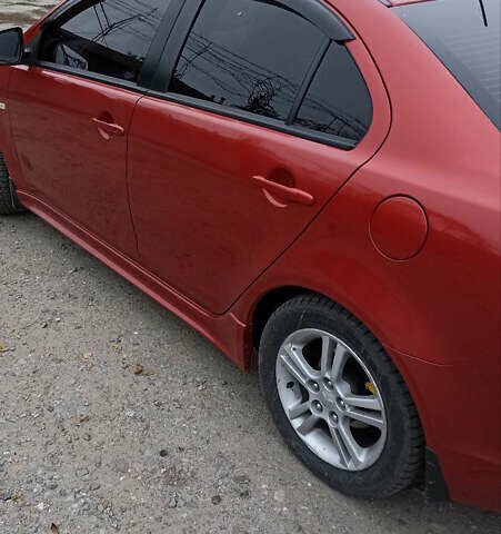 Червоний Міцубісі Lancer, об'ємом двигуна 1.5 л та пробігом 161 тис. км за 7200 $, фото 1 на Automoto.ua
