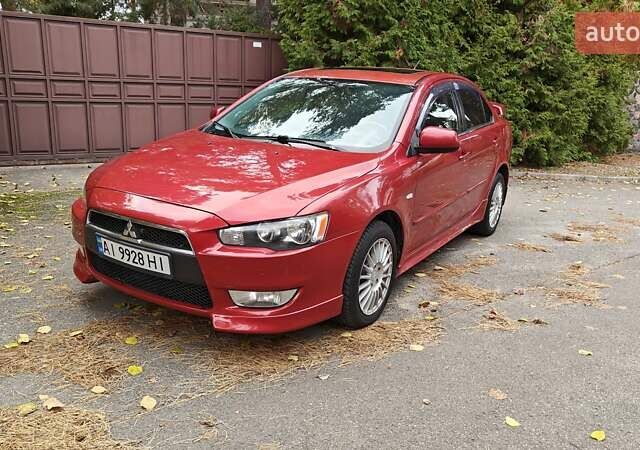 Червоний Міцубісі Lancer, об'ємом двигуна 2 л та пробігом 187 тис. км за 5500 $, фото 1 на Automoto.ua