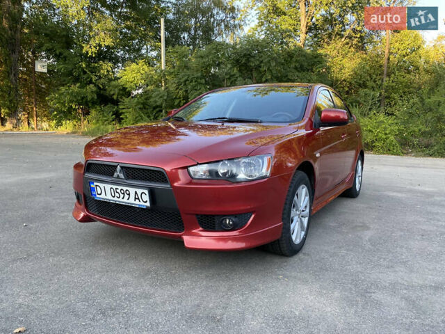 Червоний Міцубісі Lancer, об'ємом двигуна 2 л та пробігом 153 тис. км за 6700 $, фото 12 на Automoto.ua