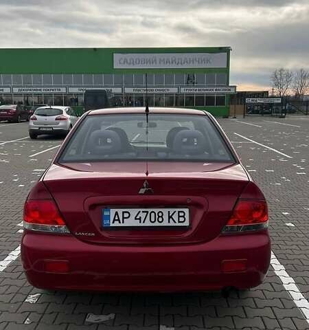 Красный Мицубиси Лансер, объемом двигателя 1.6 л и пробегом 176 тыс. км за 4300 $, фото 2 на Automoto.ua