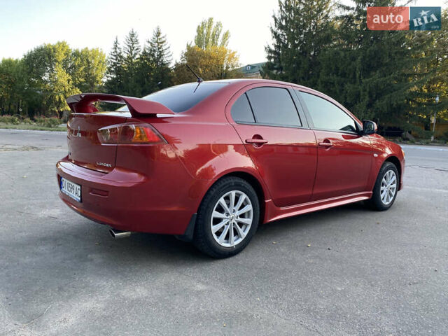 Червоний Міцубісі Lancer, об'ємом двигуна 2 л та пробігом 153 тис. км за 6700 $, фото 6 на Automoto.ua