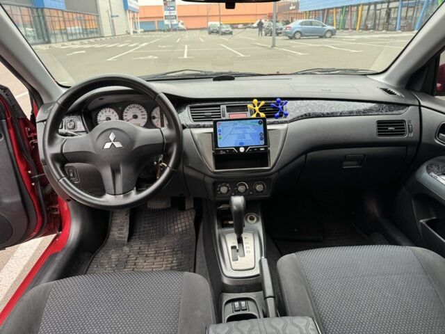 Красный Мицубиси Лансер, объемом двигателя 1.6 л и пробегом 285 тыс. км за 3650 $, фото 10 на Automoto.ua