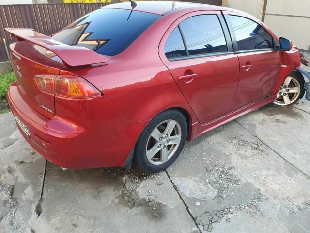 Красный Мицубиси Лансер, объемом двигателя 2 л и пробегом 406 тыс. км за 2750 $, фото 4 на Automoto.ua