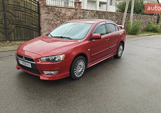 Червоний Міцубісі Lancer, об'ємом двигуна 2 л та пробігом 186 тис. км за 5600 $, фото 2 на Automoto.ua