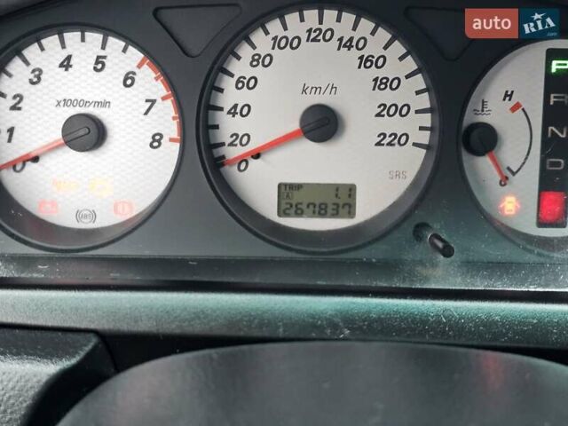 Червоний Міцубісі Lancer, об'ємом двигуна 1.6 л та пробігом 267 тис. км за 2999 $, фото 13 на Automoto.ua