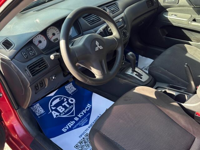 Красный Мицубиси Лансер, объемом двигателя 1.6 л и пробегом 230 тыс. км за 5300 $, фото 15 на Automoto.ua
