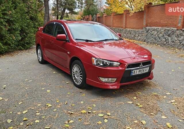 Червоний Міцубісі Lancer, об'ємом двигуна 2 л та пробігом 187 тис. км за 5500 $, фото 2 на Automoto.ua