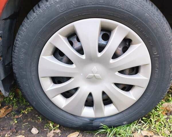 Красный Мицубиси Лансер, объемом двигателя 1.6 л и пробегом 214 тыс. км за 5000 $, фото 18 на Automoto.ua