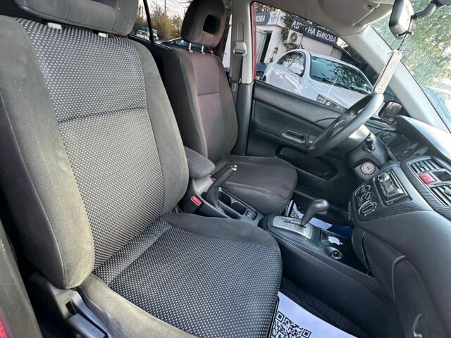 Красный Мицубиси Лансер, объемом двигателя 1.6 л и пробегом 230 тыс. км за 5300 $, фото 9 на Automoto.ua