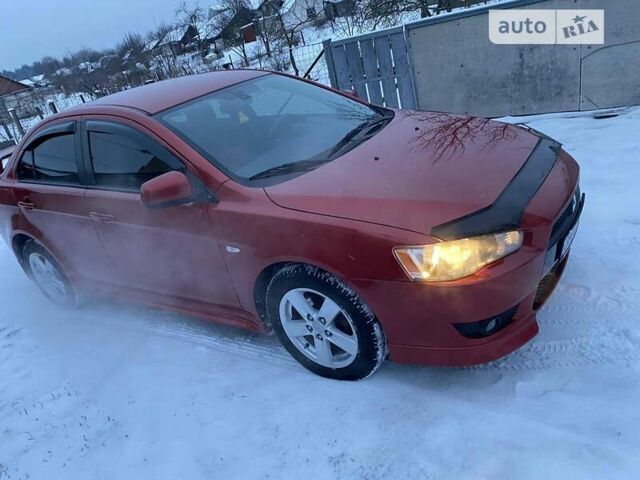 Червоний Міцубісі Lancer, об'ємом двигуна 2 л та пробігом 171 тис. км за 7500 $, фото 9 на Automoto.ua