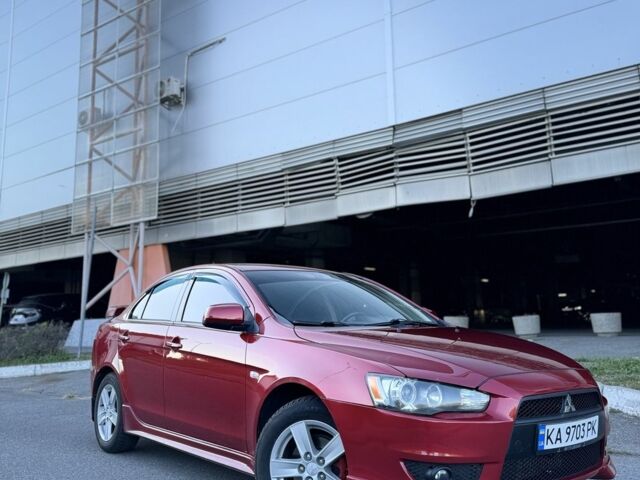 Красный Мицубиси Лансер, объемом двигателя 2 л и пробегом 307 тыс. км за 6499 $, фото 1 на Automoto.ua