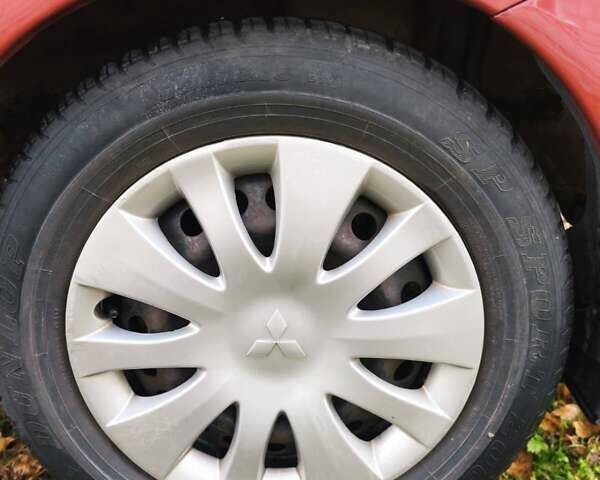 Красный Мицубиси Лансер, объемом двигателя 1.6 л и пробегом 214 тыс. км за 5000 $, фото 13 на Automoto.ua