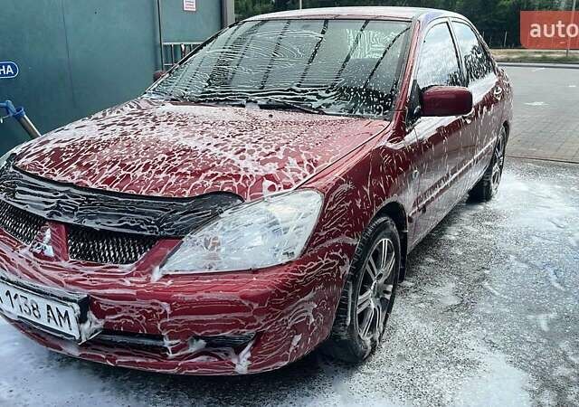 Красный Мицубиси Лансер, объемом двигателя 0 л и пробегом 282 тыс. км за 5200 $, фото 9 на Automoto.ua