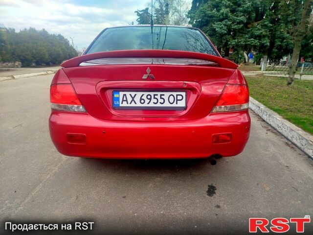 Красный Мицубиси Лансер, объемом двигателя 1.6 л и пробегом 174 тыс. км за 4700 $, фото 2 на Automoto.ua