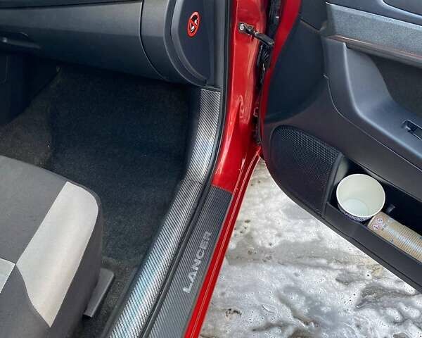 Красный Мицубиси Лансер, объемом двигателя 1.5 л и пробегом 204 тыс. км за 5998 $, фото 17 на Automoto.ua