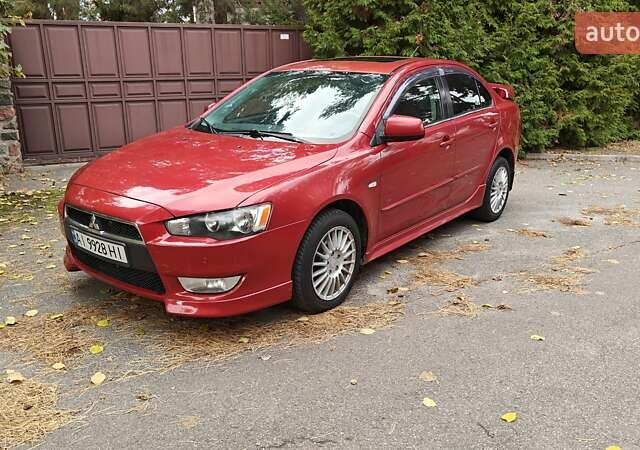 Міцубісі Lancer 2007 у Києві на Automoto.ua Червоний Міцубісі Lancer, об'ємом двигуна 2 л та пробігом 186 тис. км за 5600 $, фото 5 на Automoto.ua