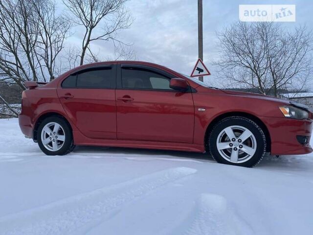 Червоний Міцубісі Lancer, об'ємом двигуна 2 л та пробігом 171 тис. км за 7500 $, фото 20 на Automoto.ua