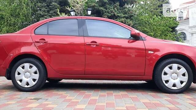 Червоний Міцубісі Lancer, об'ємом двигуна 1.5 л та пробігом 115 тис. км за 8155 $, фото 11 на Automoto.ua