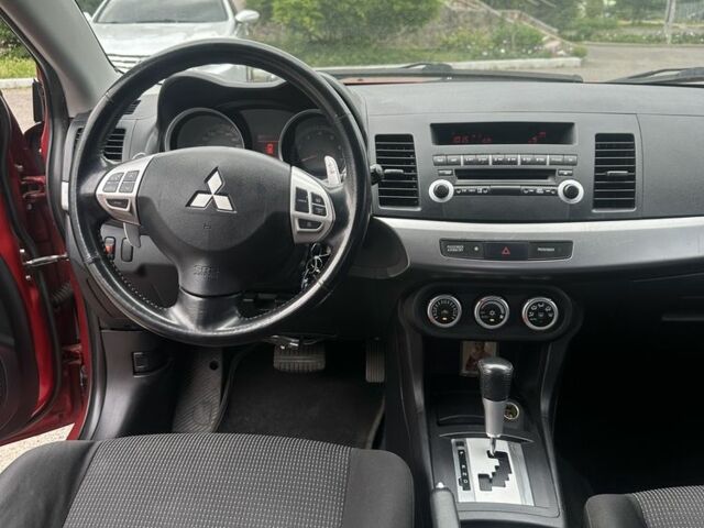 Червоний Міцубісі Lancer, об'ємом двигуна 2 л та пробігом 184 тис. км за 5999 $, фото 11 на Automoto.ua