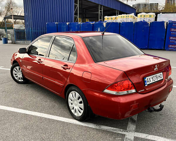 Червоний Міцубісі Lancer, об'ємом двигуна 1.6 л та пробігом 194 тис. км за 5500 $, фото 4 на Automoto.ua