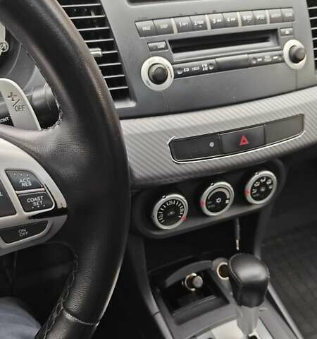 Червоний Міцубісі Lancer, об'ємом двигуна 2 л та пробігом 186 тис. км за 5600 $, фото 15 на Automoto.ua