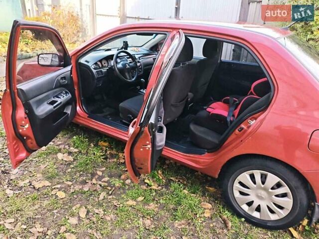 Красный Мицубиси Лансер, объемом двигателя 1.6 л и пробегом 214 тыс. км за 5000 $, фото 9 на Automoto.ua