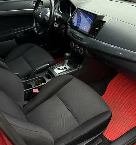 Красный Мицубиси Лансер, объемом двигателя 2 л и пробегом 261 тыс. км за 7200 $, фото 16 на Automoto.ua