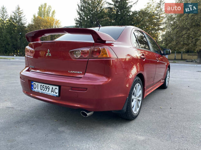Червоний Міцубісі Lancer, об'ємом двигуна 2 л та пробігом 153 тис. км за 6700 $, фото 5 на Automoto.ua