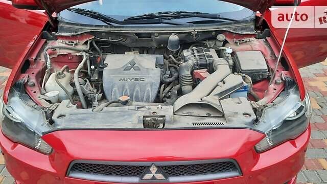 Красный Мицубиси Лансер, объемом двигателя 1.5 л и пробегом 115 тыс. км за 8155 $, фото 69 на Automoto.ua