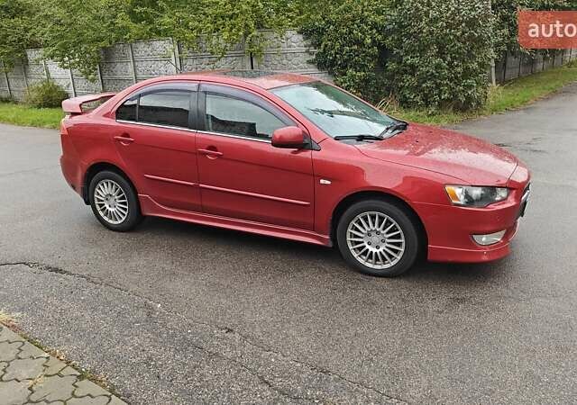 Червоний Міцубісі Lancer, об'ємом двигуна 2 л та пробігом 186 тис. км за 5600 $, фото 4 на Automoto.ua