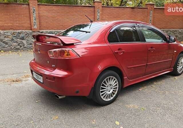 Червоний Міцубісі Lancer, об'ємом двигуна 2 л та пробігом 187 тис. км за 5500 $, фото 9 на Automoto.ua