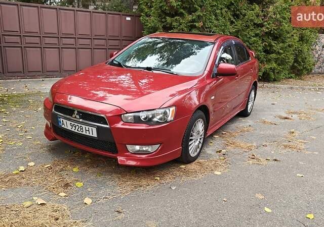 Міцубісі Lancer 2007 у Києві на Automoto.ua Червоний Міцубісі Lancer, об'ємом двигуна 2 л та пробігом 186 тис. км за 5600 $, фото 7 на Automoto.ua