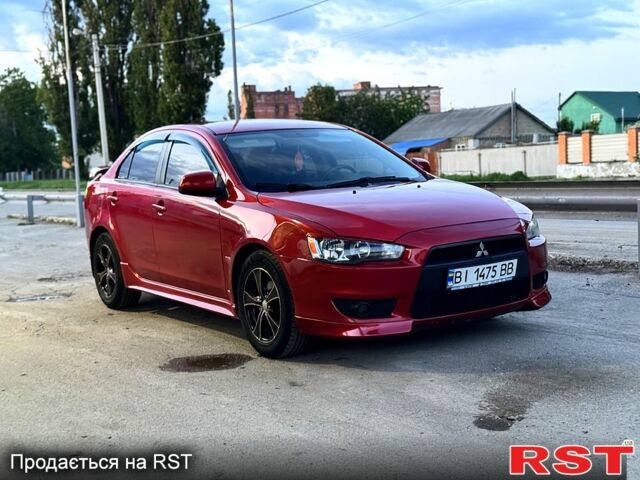 Красный Мицубиси Лансер, объемом двигателя 2 л и пробегом 180 тыс. км за 6500 $, фото 3 на Automoto.ua